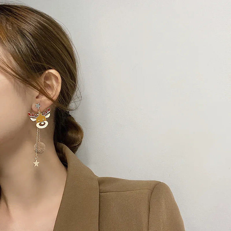 ORECCHINI PENDENTI POMPON