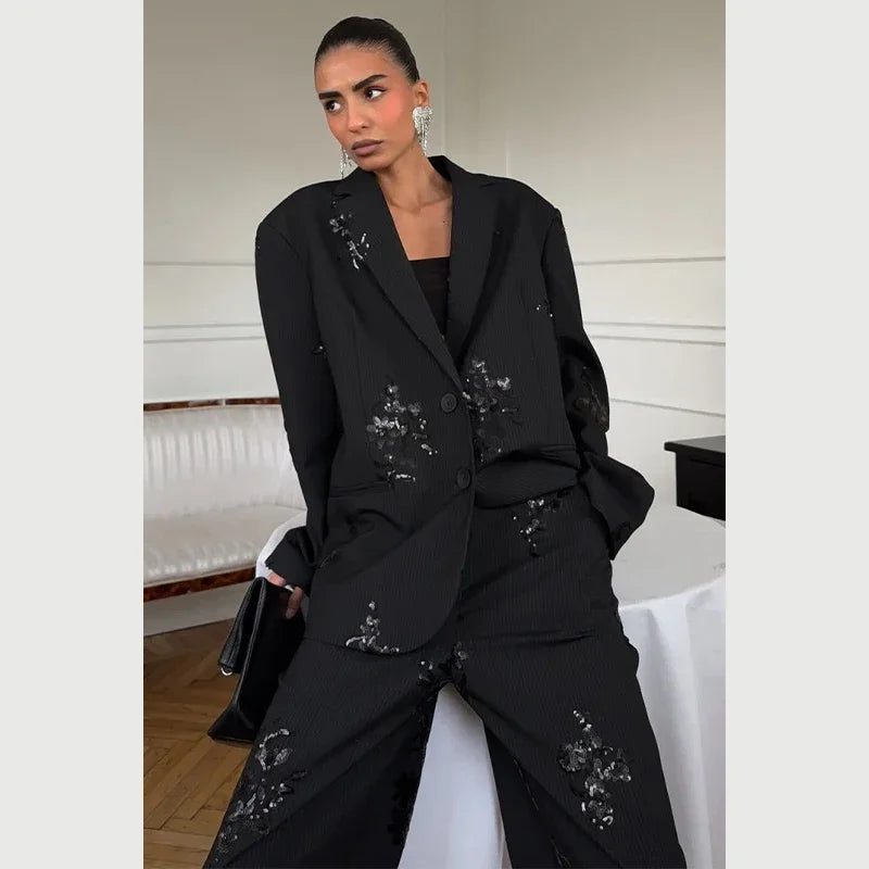 PANTALONE GESSATO CON PAILLETTES