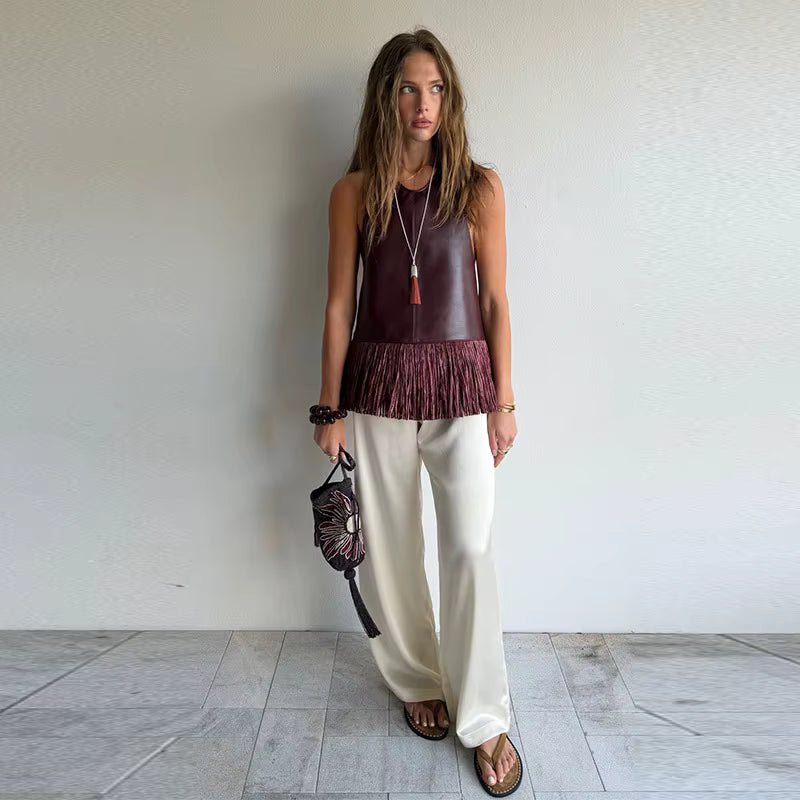 TOP IN ECOPELLE CON FRANGE