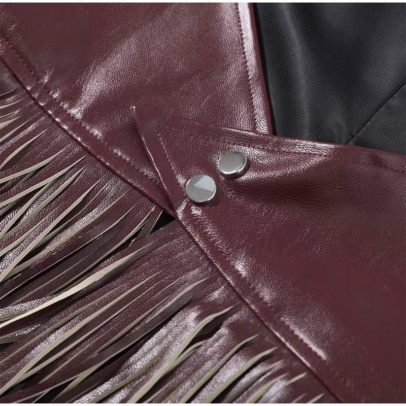 TOP IN ECOPELLE CON FRANGE