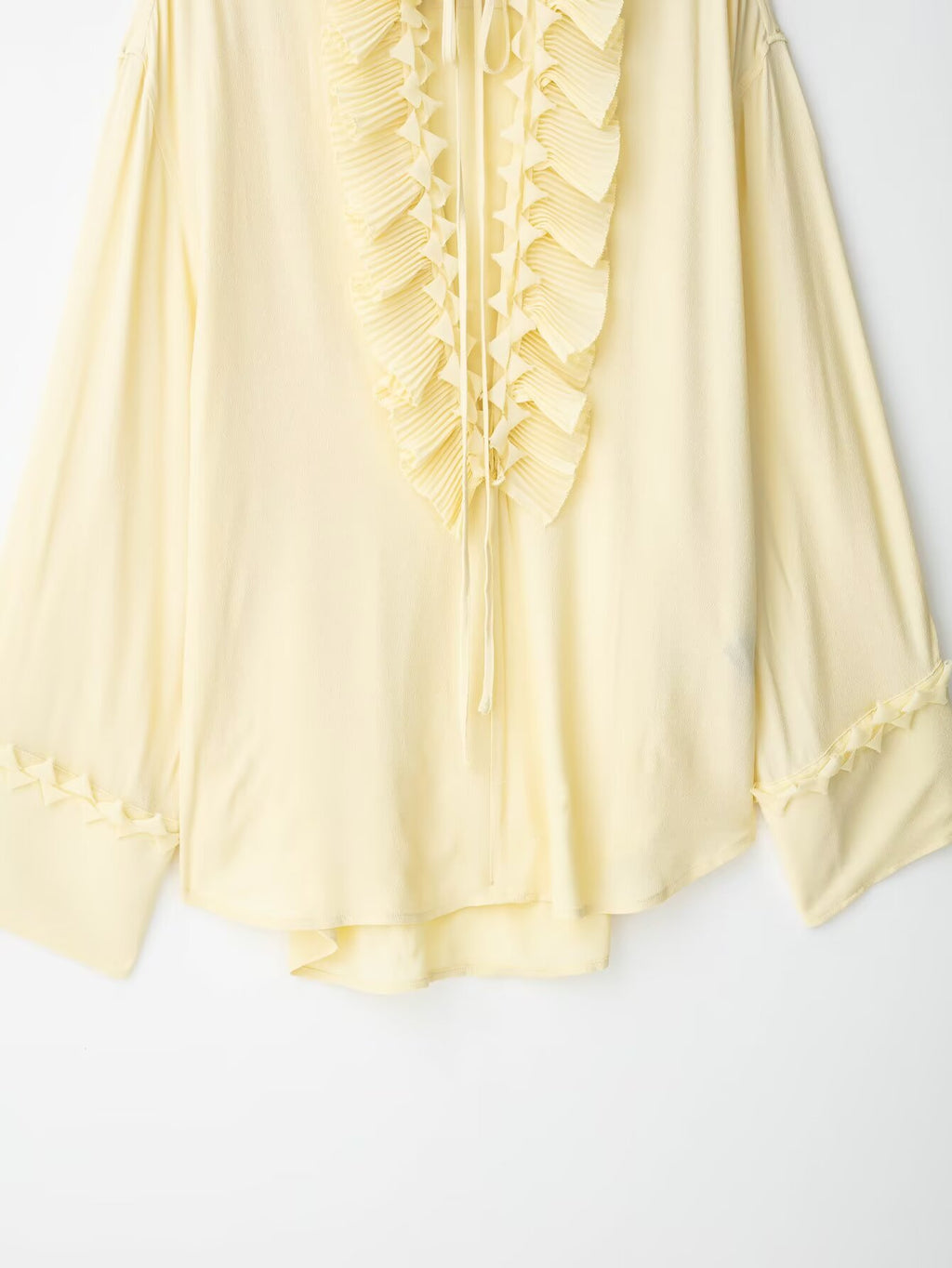 CAMICIA CON MOTIVO PLISSE'