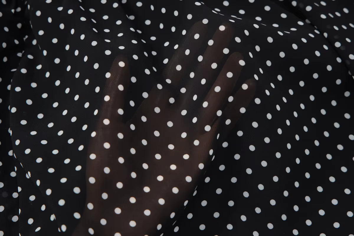 VESTITO A POIS NERO