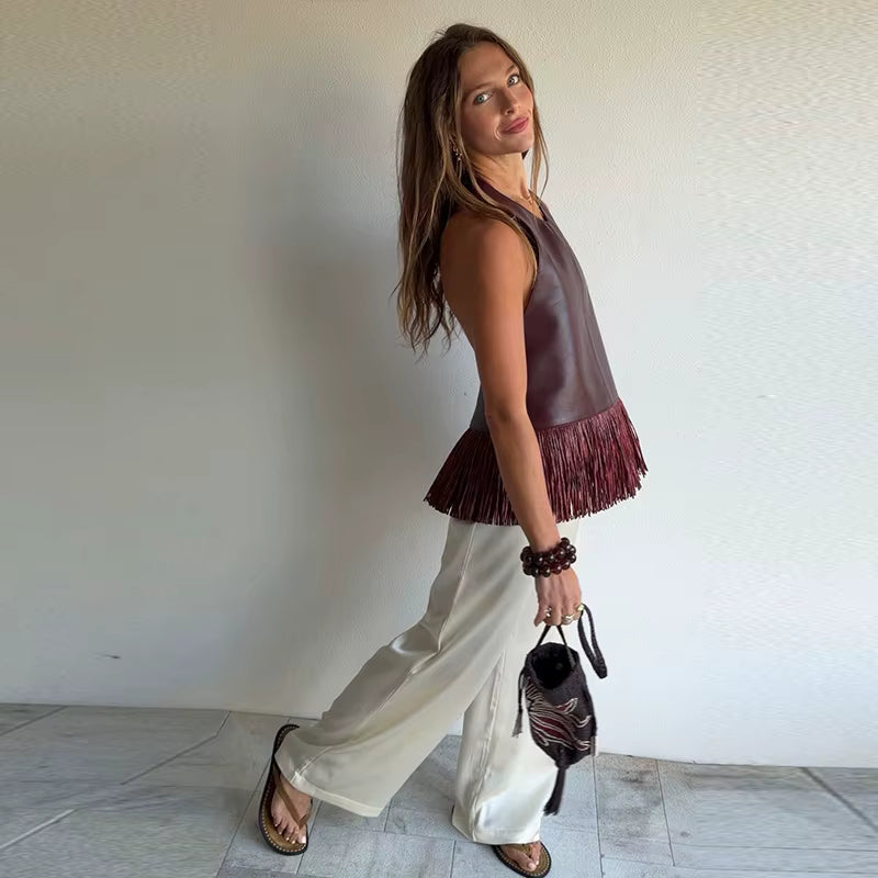 TOP IN ECOPELLE CON FRANGE