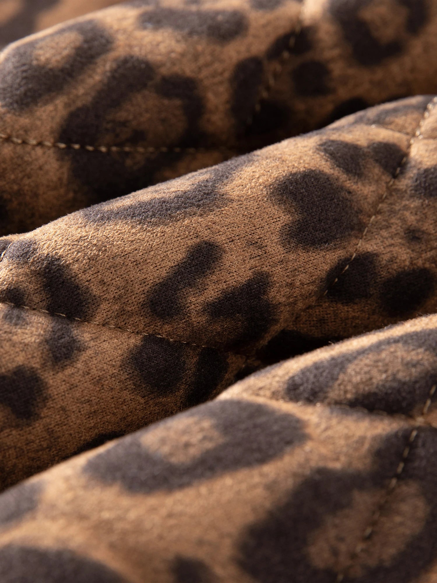 GIACCA TRAPUNTATA ANIMALIER