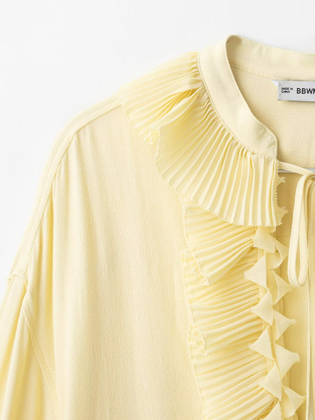 CAMICIA CON MOTIVO PLISSE'