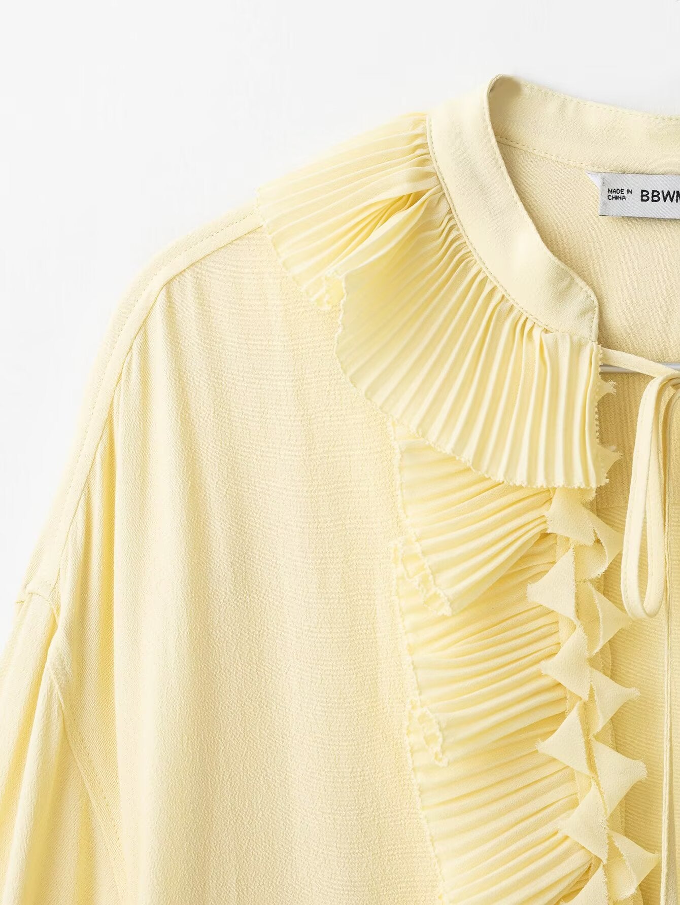 CAMICIA CON MOTIVO PLISSE'