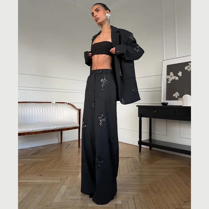 PANTALONE GESSATO CON PAILLETTES