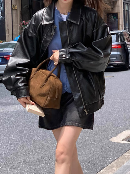 OVERSIZED BOMBER IN AGED ECO-LEATHER